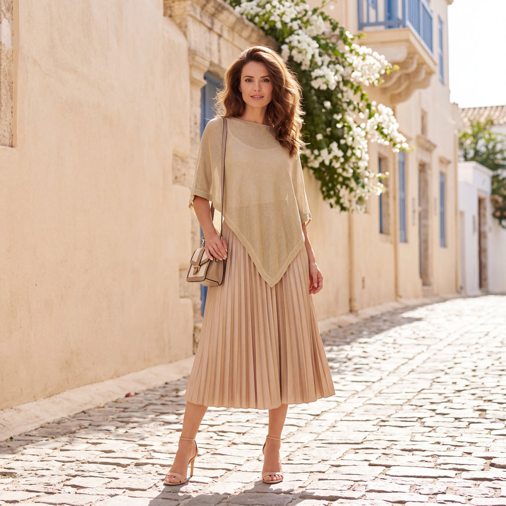 Latte Beige asymmetric lurex poncho with shimmering metallic knit by MARIΓIOU