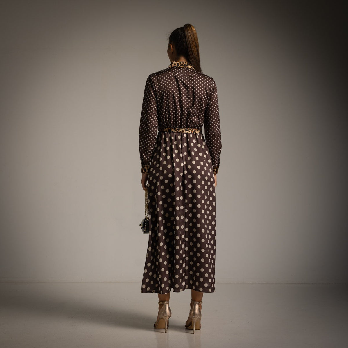 Cocoa Brown polka dot shirt dress with leopard print collar, cuffs and tie belt - back view