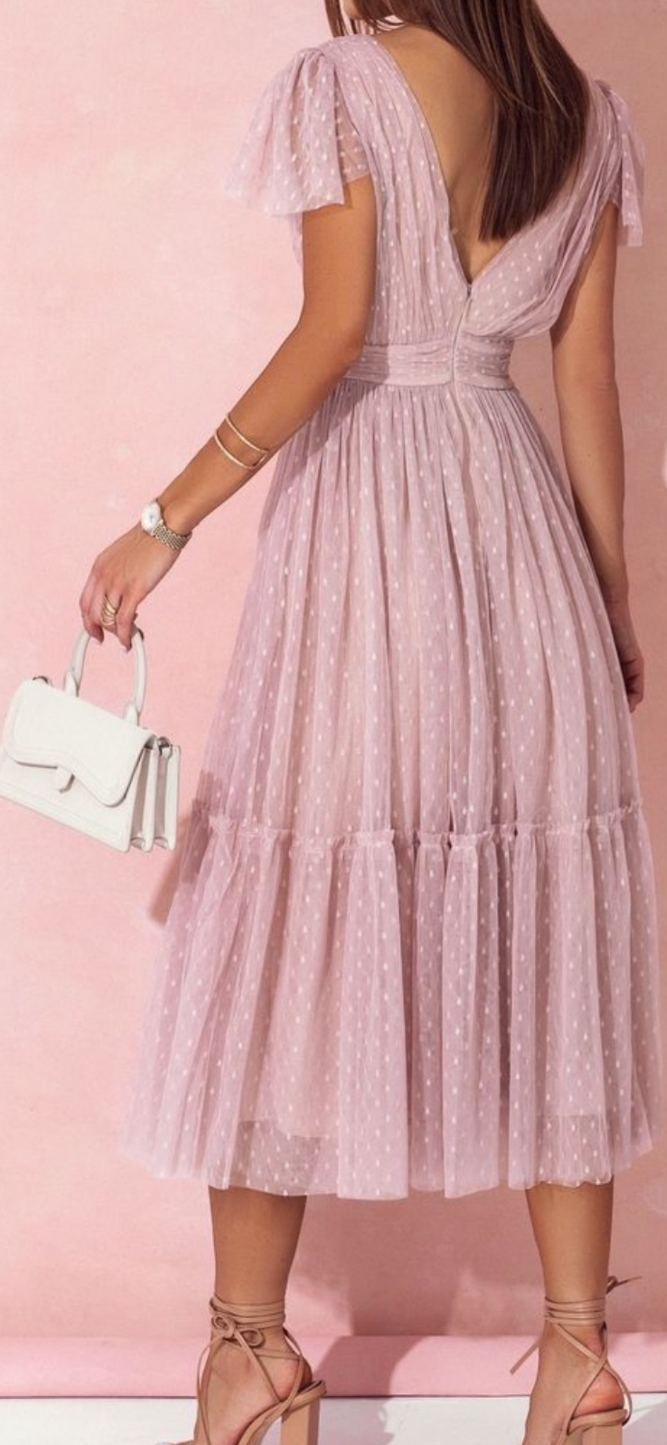 Back view of the Nude 100% nylon tulle midi dress with layered skirt and fitted waist MARIΓIOÚ