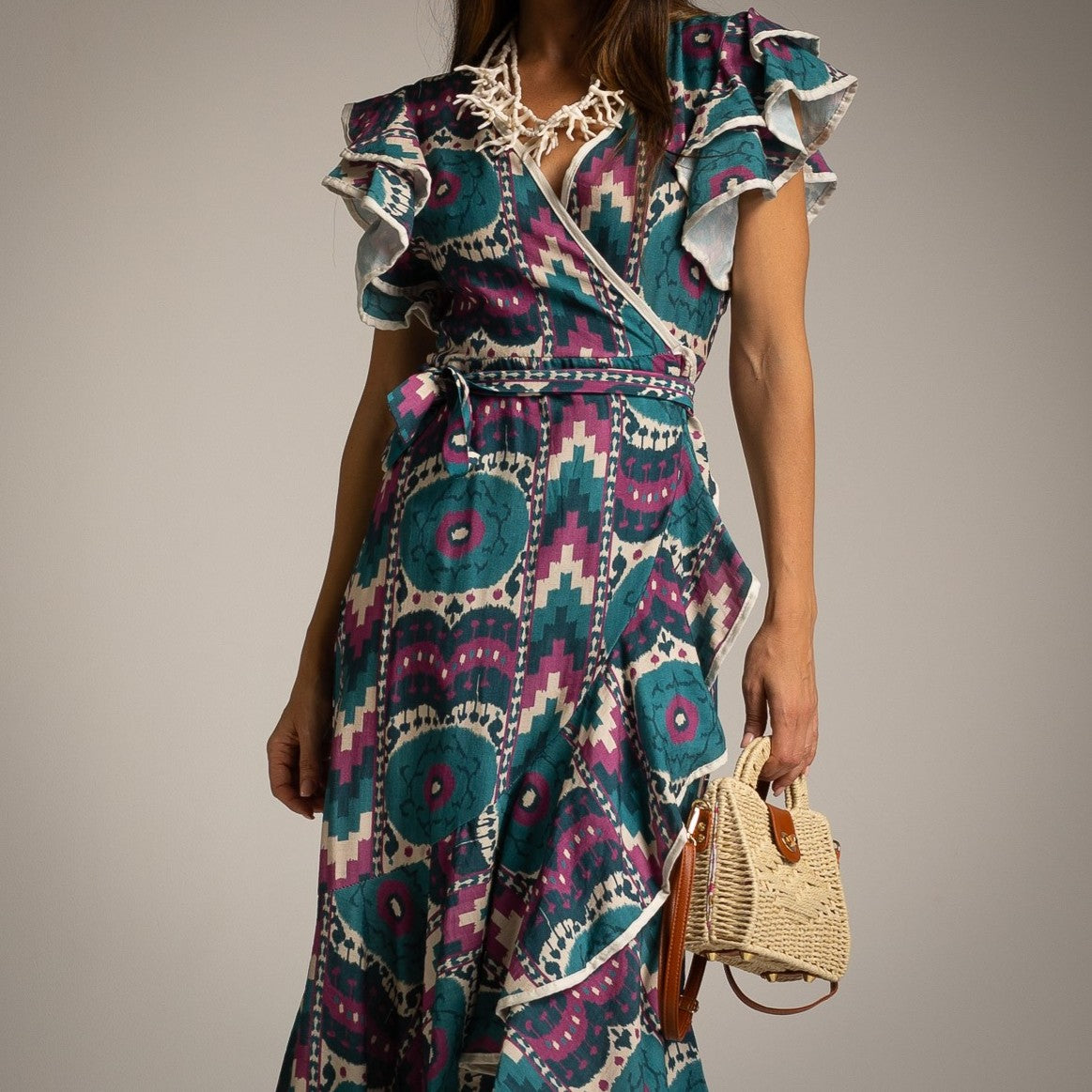 Close-up of Ocean Mosaic wrap dress with bohemian-inspired Mediterranean print