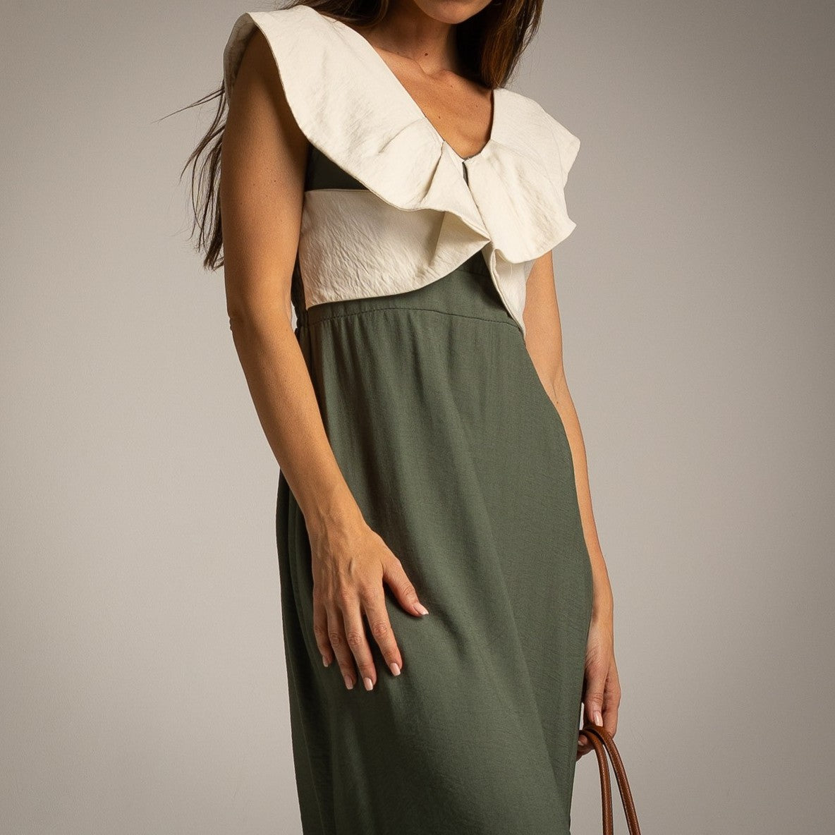 Close-up of Olive Grove summer midi dress with elegant ruffle neckline