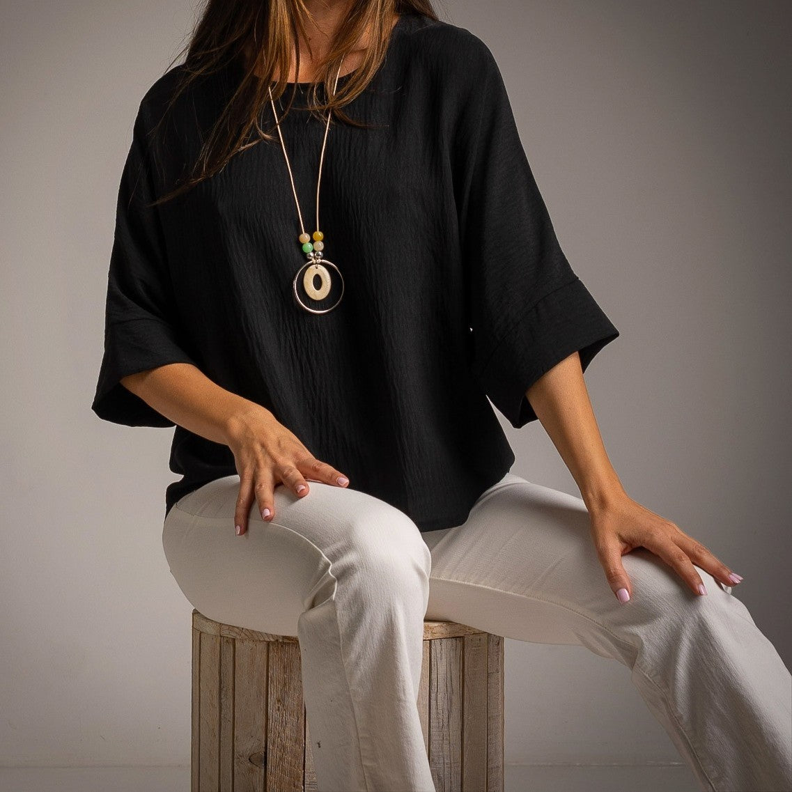 Black oversized one size shirt close look soft fabric and wide sleeves