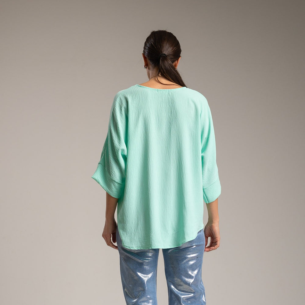 Mint oversized shirt back view loose fit made in Italy by MARIΓIOÚ