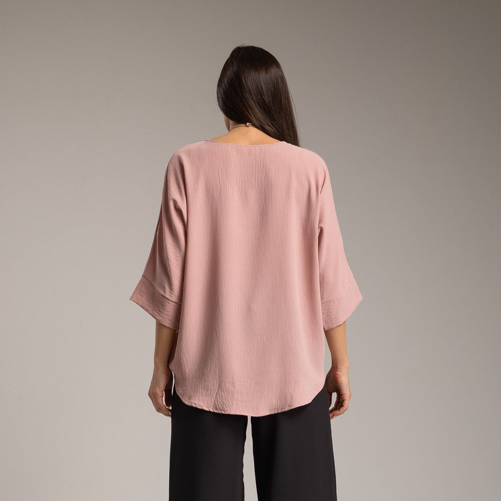 Rose oversized shirt back view relaxed silhouette made in Italy