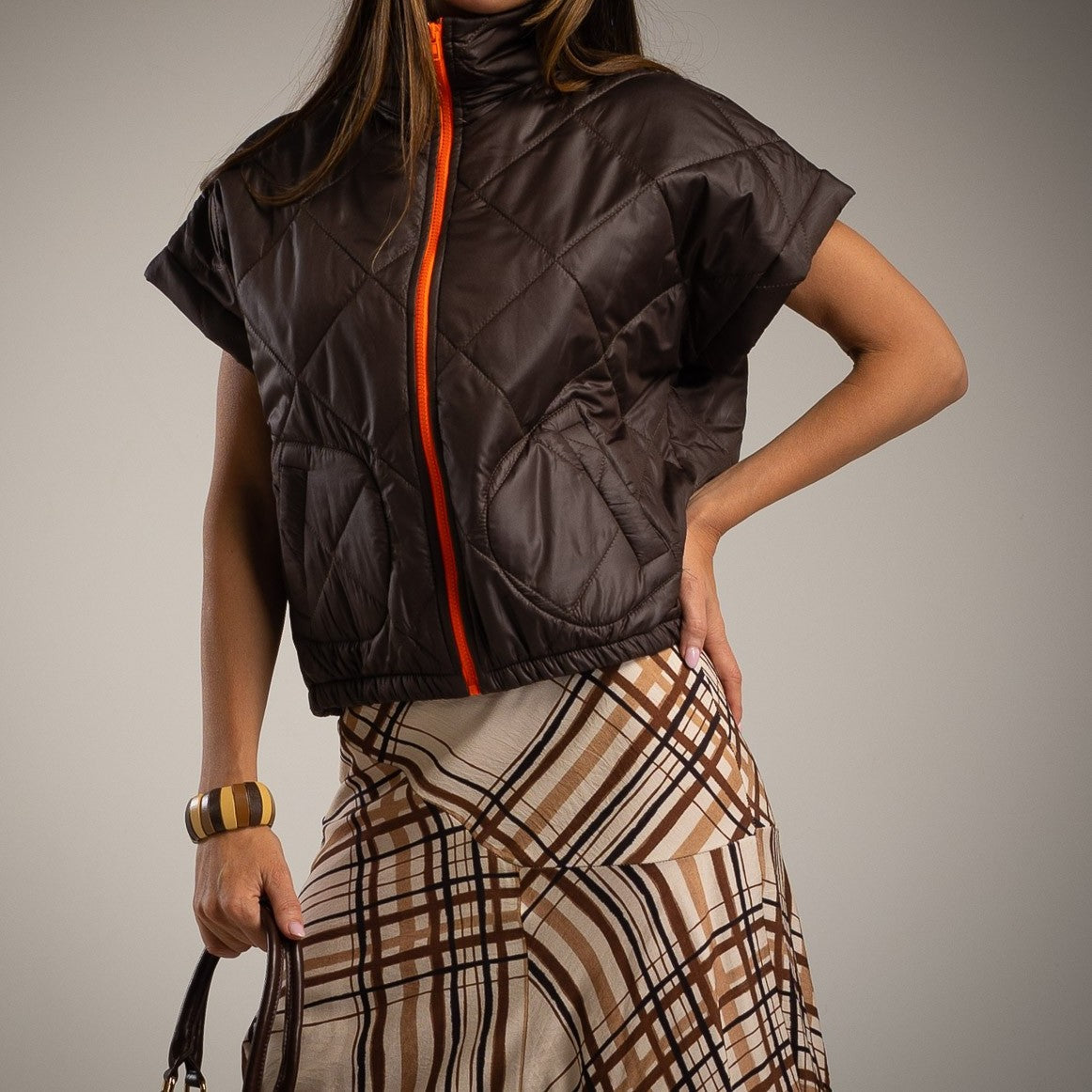 marigiou padded vest with neon zipper in chocolate – close-up front