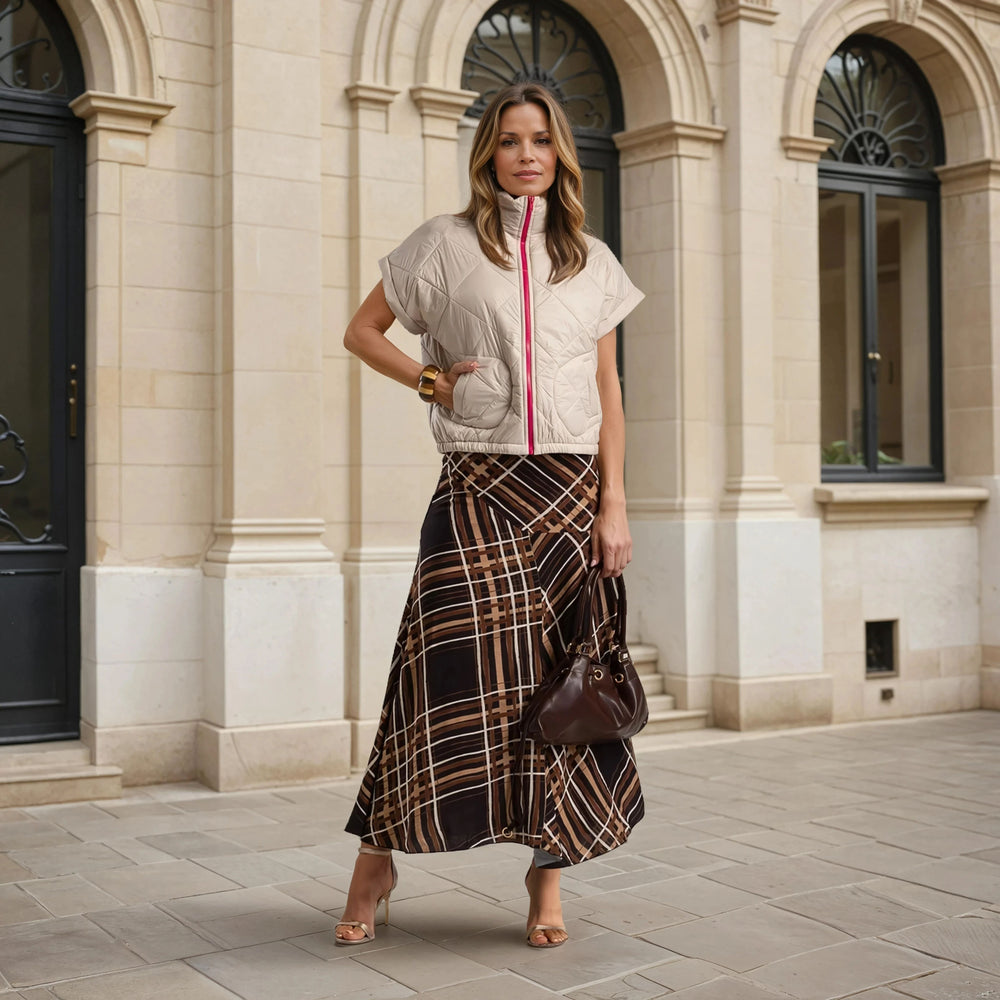 marigiou padded vest with neon zipper in creme – front view