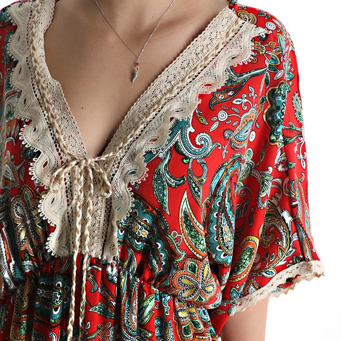 Red paisley boho maxi dress with cream lace neckline and tassel ties