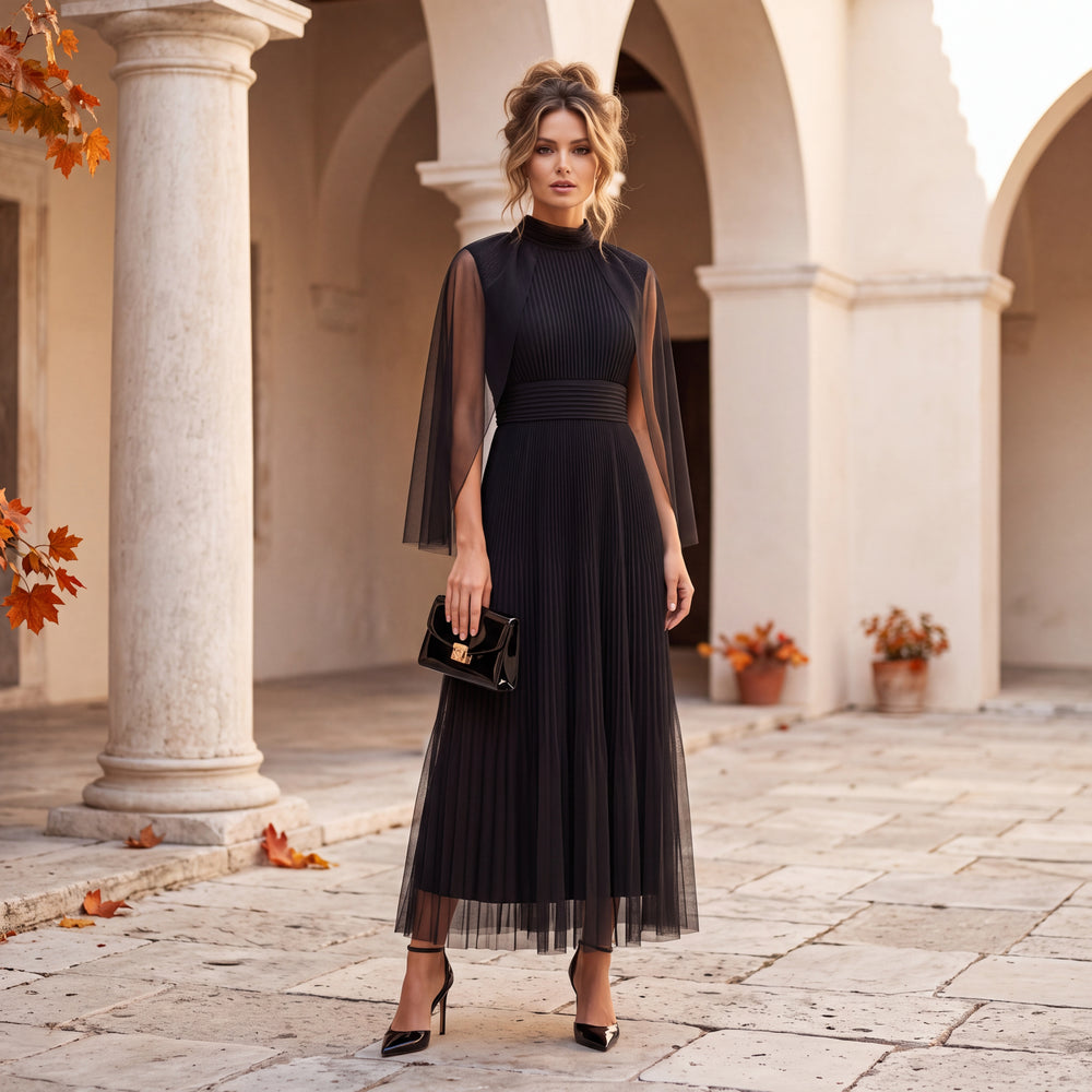 Black pleated midi dress with high neck and sheer mesh cape sleeves by MARIΓIOU
