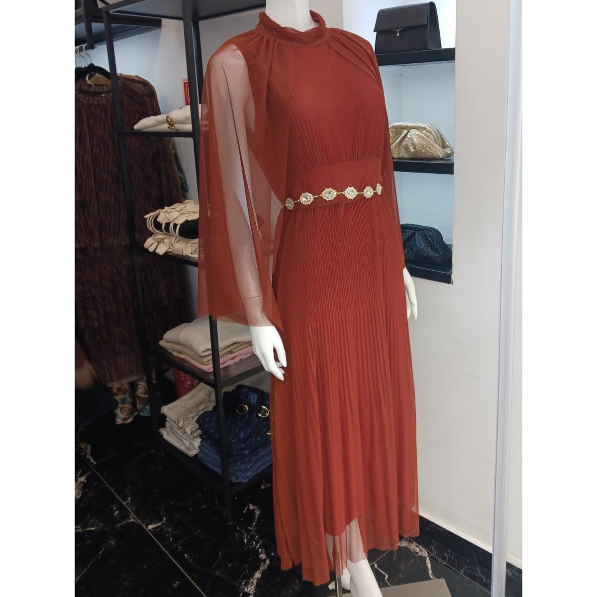 Terracotta Clay pleated midi dress with high neck and sheer mesh cape sleeves - front view