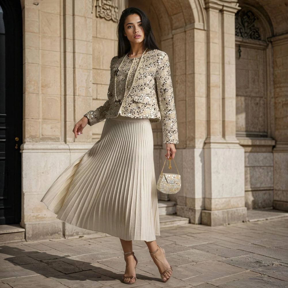 Pleated knit midi skirt styled with sequin jacket – outdoor full look
