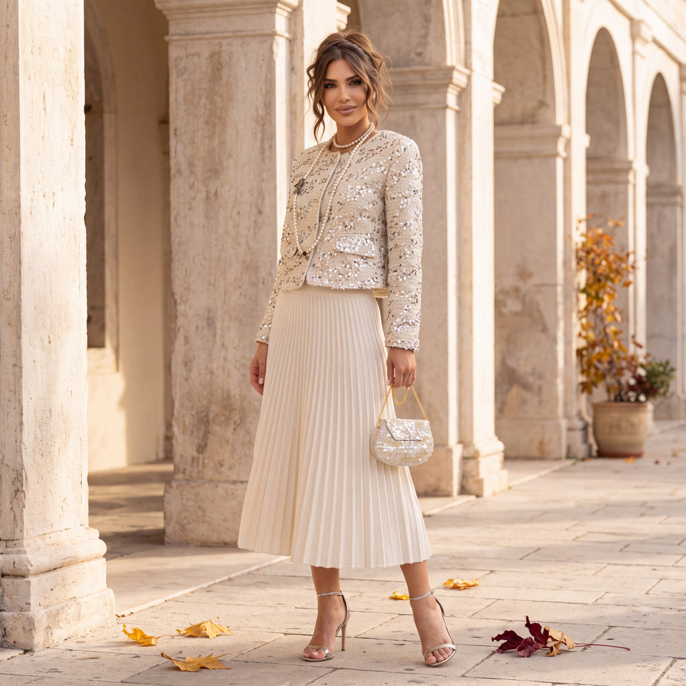 Pleated knit midi skirt styled with sequin jacket – outdoor full look