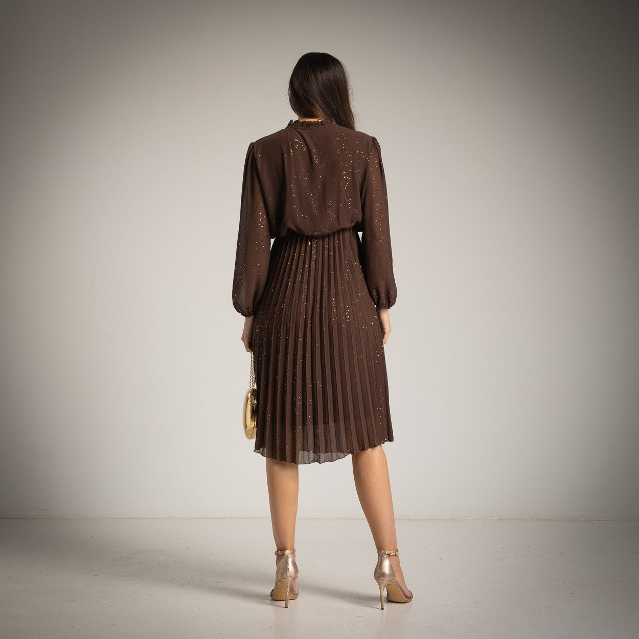 Chocolate glitter pleated midi dress by MARIΓIOÚ, back view