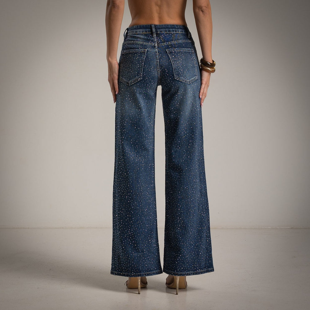 Back view of rhinestone wide leg jeans in dark blue by MARIΓIOÚ