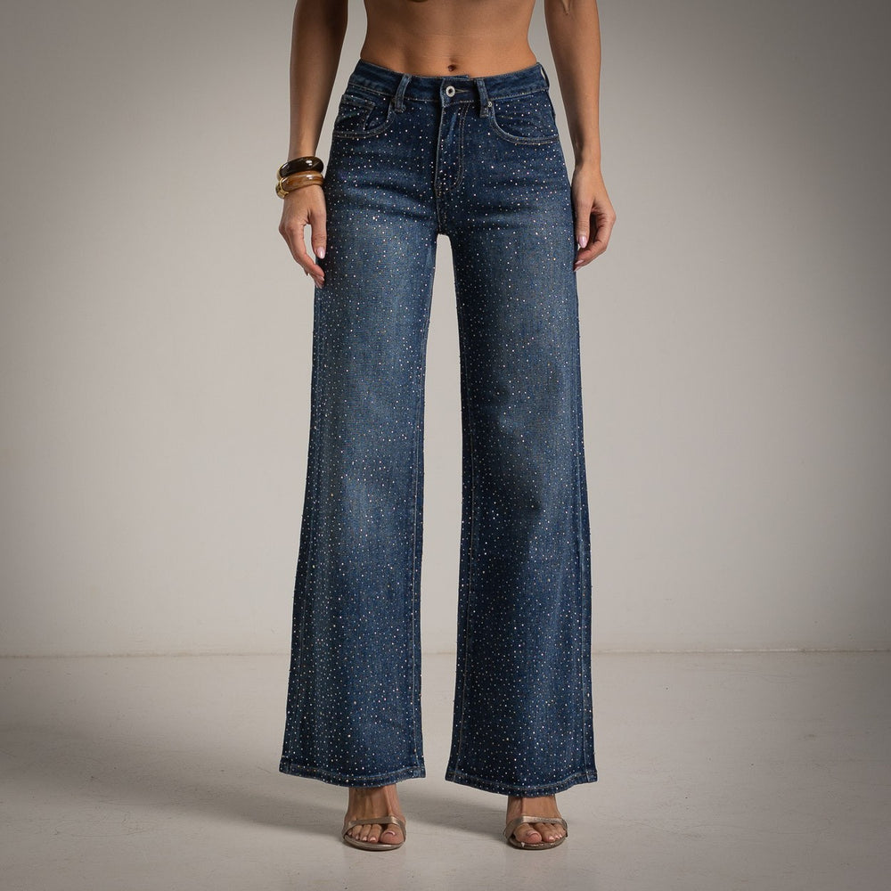 Dark blue wide leg jeans with rhinestone embellishment by MARIΓIOÚ front view