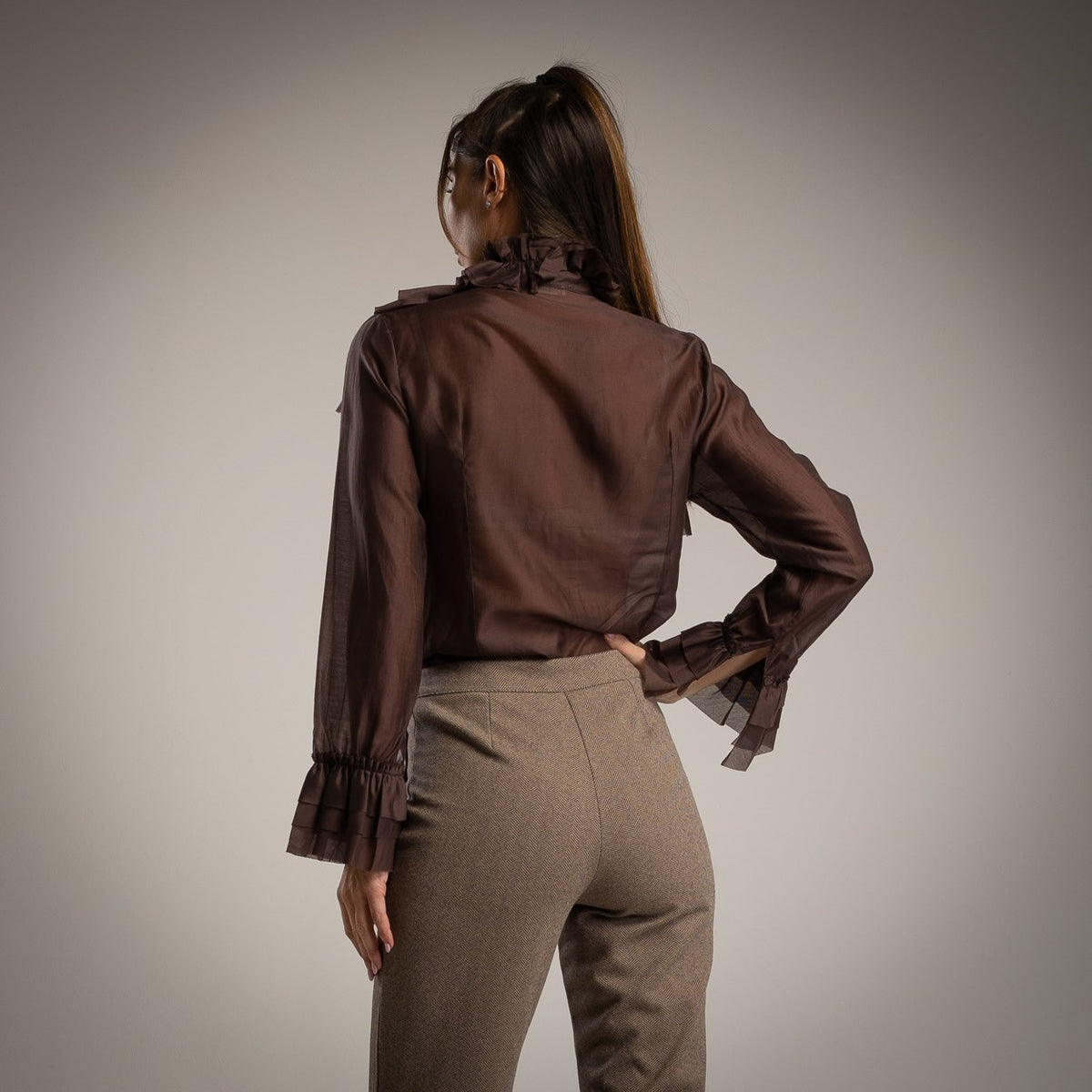 Cocoa Brown ruffle blouse with tie bow neck and flounced cuffs - back view