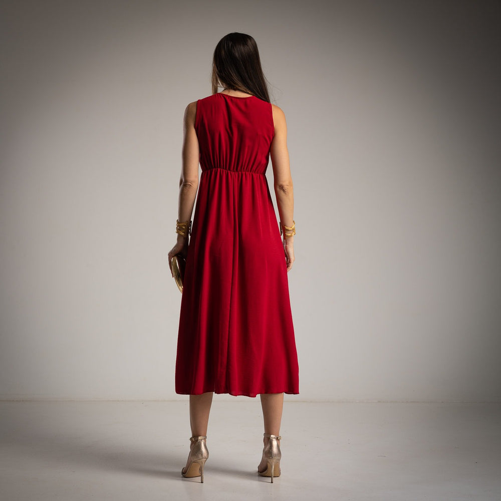 Ruby Red sleeveless asymmetrical midi dress back view with elegant draped silhouette