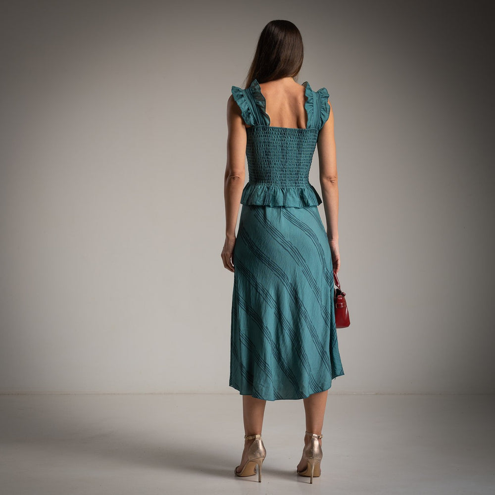 Petrol blue two-piece set with smocked ruffle top and midi skirt, back view
