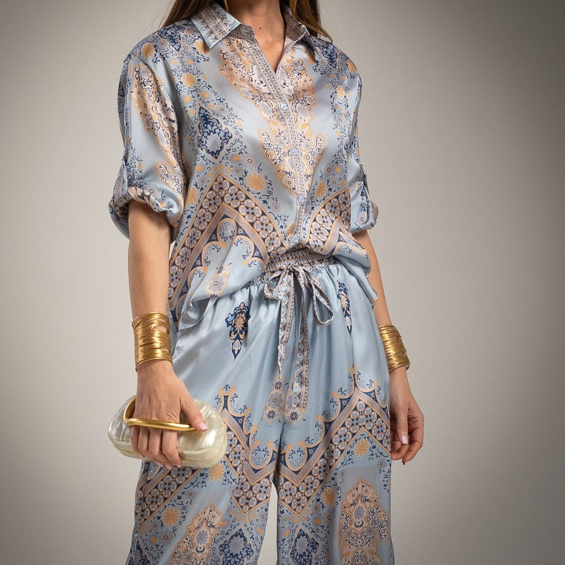 satin baroque print co ord set blouse and pants front detail light blue luxury outfit