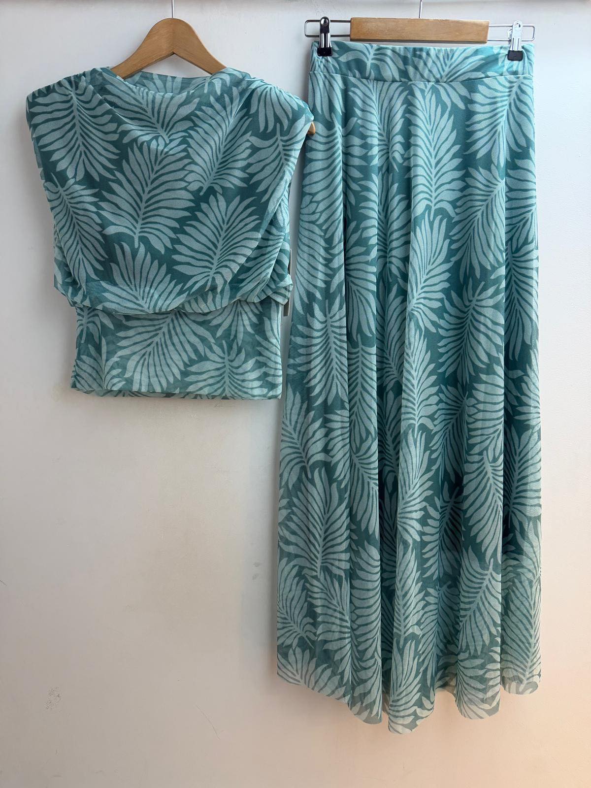 Sea blue palm print one size set with sleeveless top and flowing maxi skirt hanging view