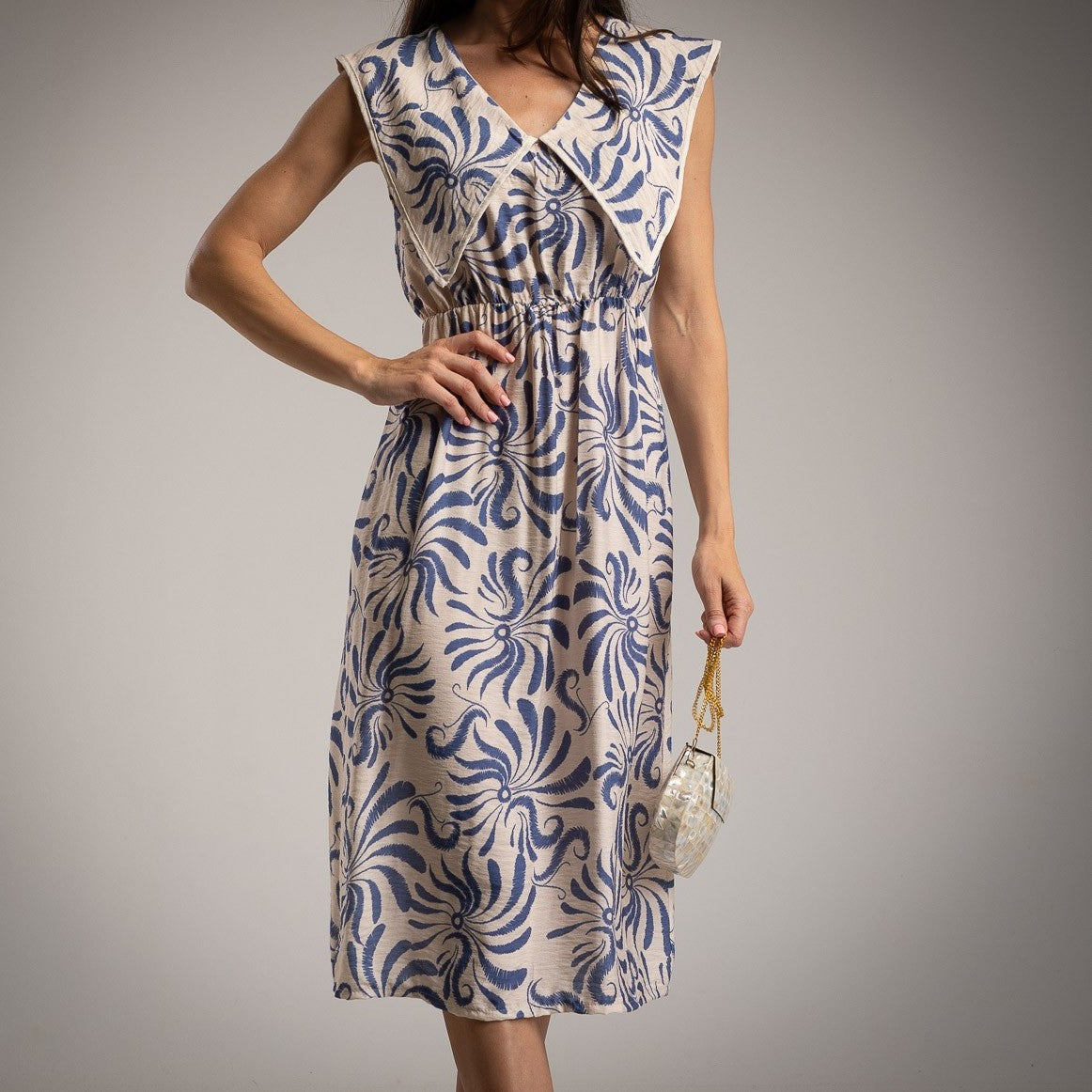 MARIΓIOÚ sea blue patterned midi dress elegant summer front view