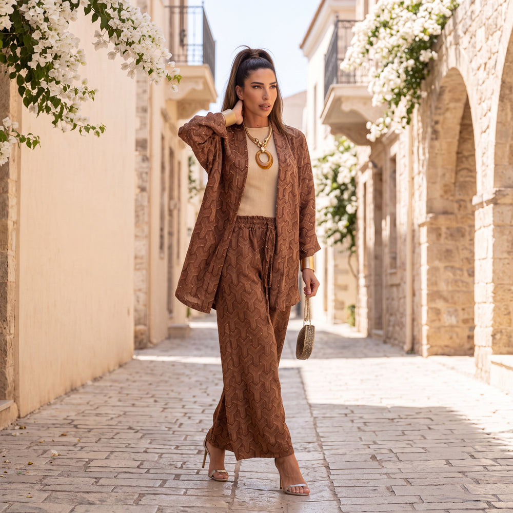 Woman wearing the Siena Textured Co-Ord Set in Cinnamon Brown styled outdoors with an elegant autumn look.