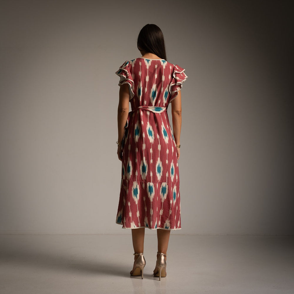 MARIΓIOÚ red ikat print summer midi dress back view with belt and flowy silhouette