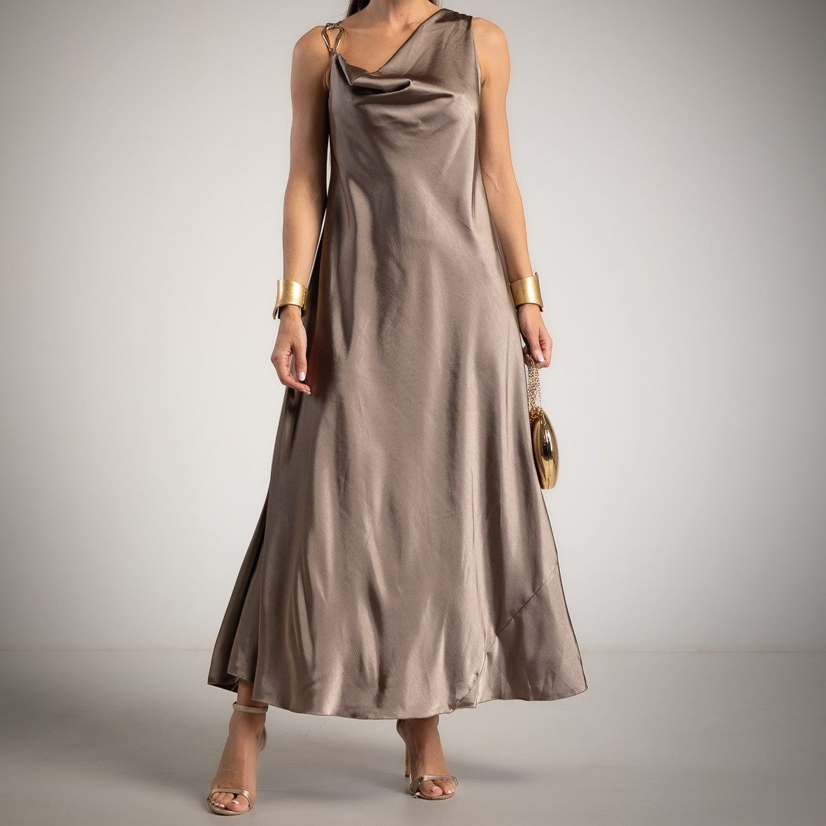Taupe satin maxi dress featuring a draped neckline and flowing silhouette