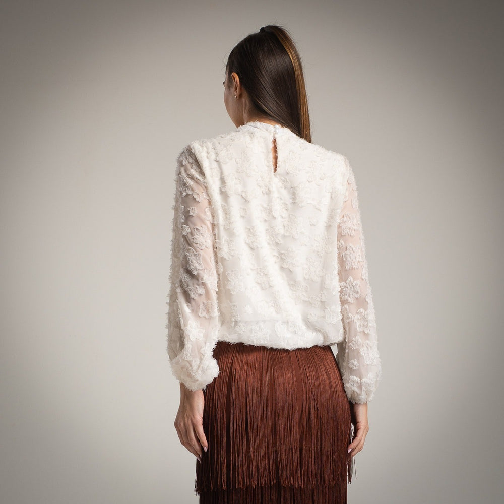 White sheer blouse with floral texture – back view