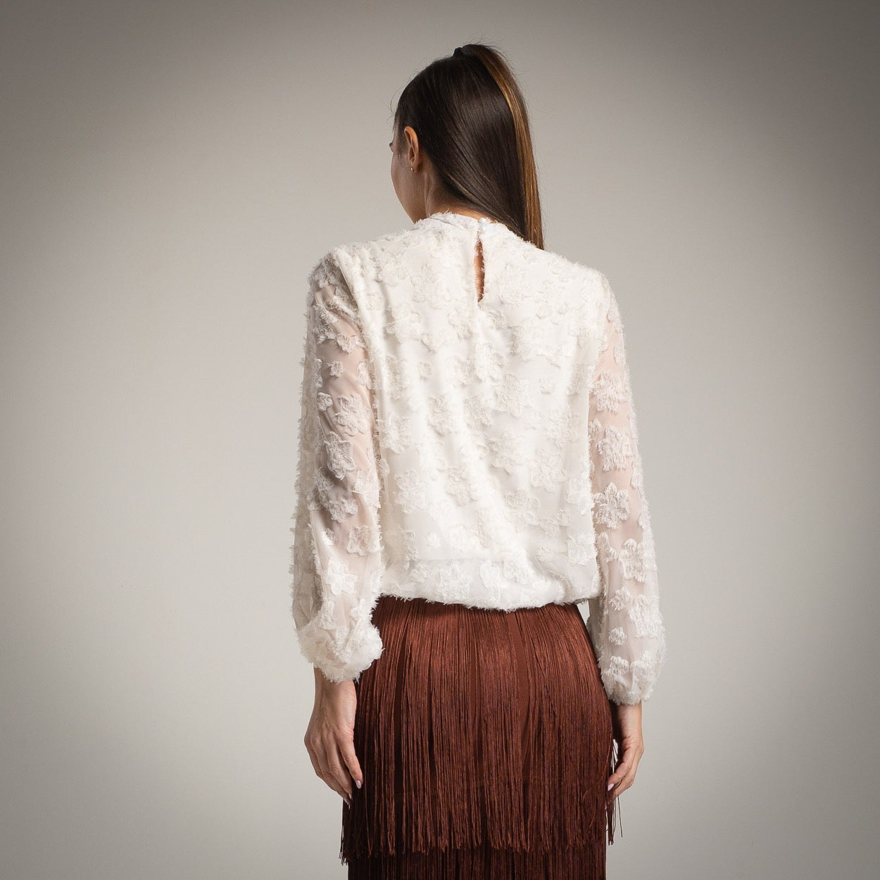 White sheer blouse with floral texture – back view