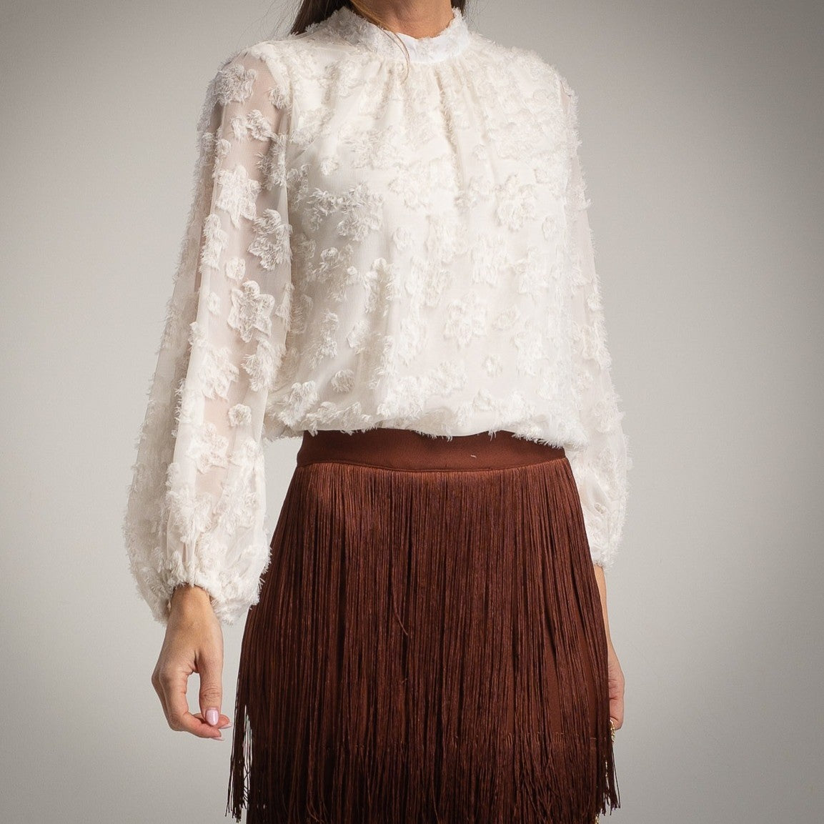 White textured sheer blouse with floral details – front view