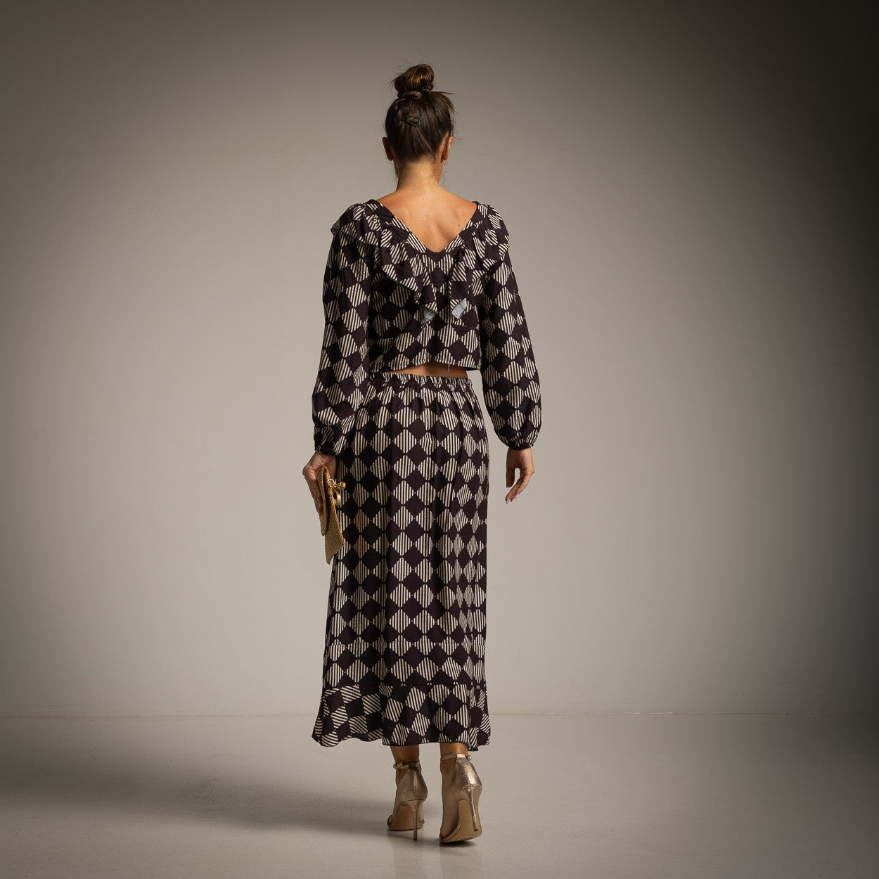 Back view of the Valentina printed two-piece set in Classic Black