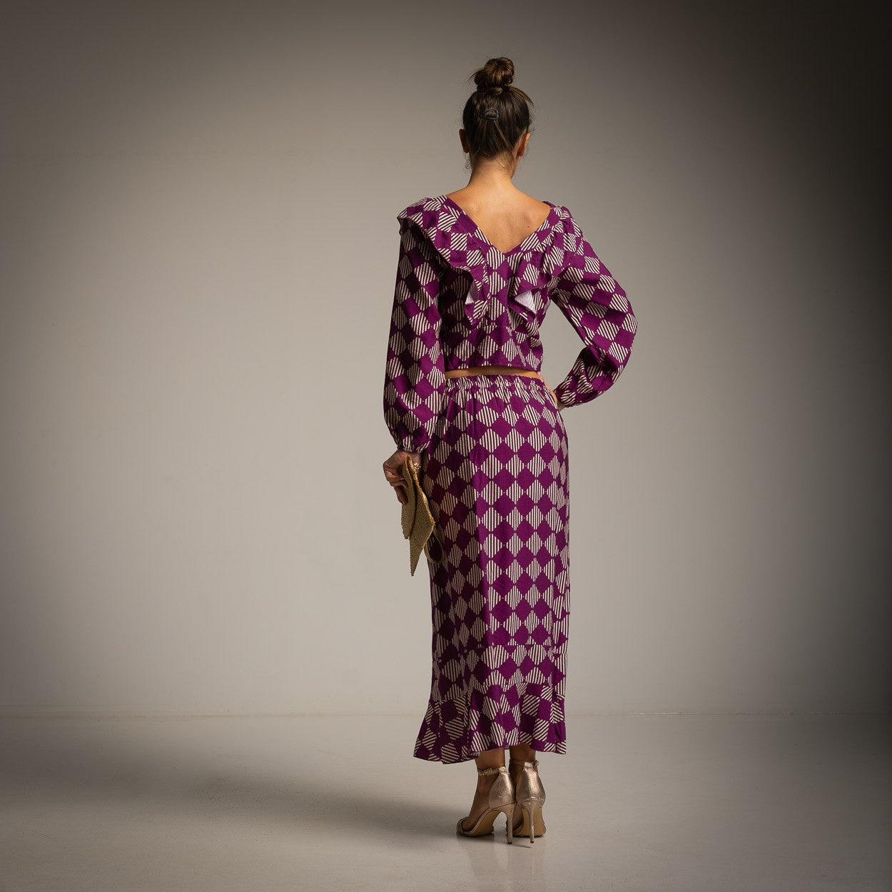 Back view of the Valentina printed two-piece set in Wild Berry