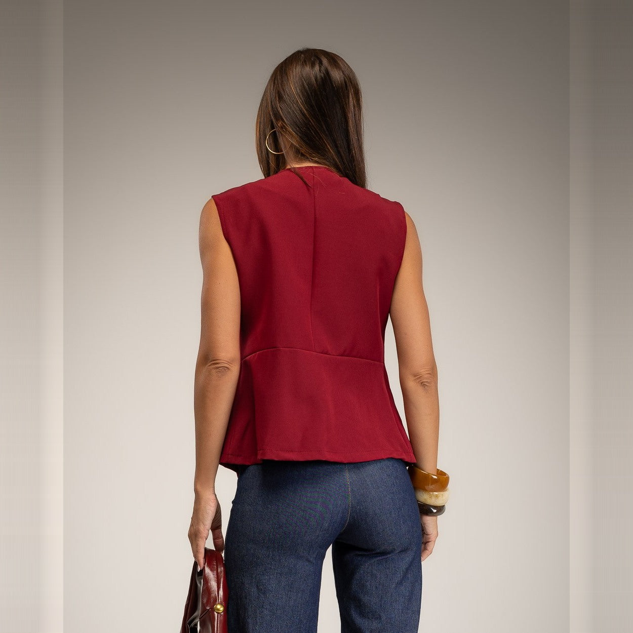 Burgundy sleeveless military braid vest with gold buttons - back view