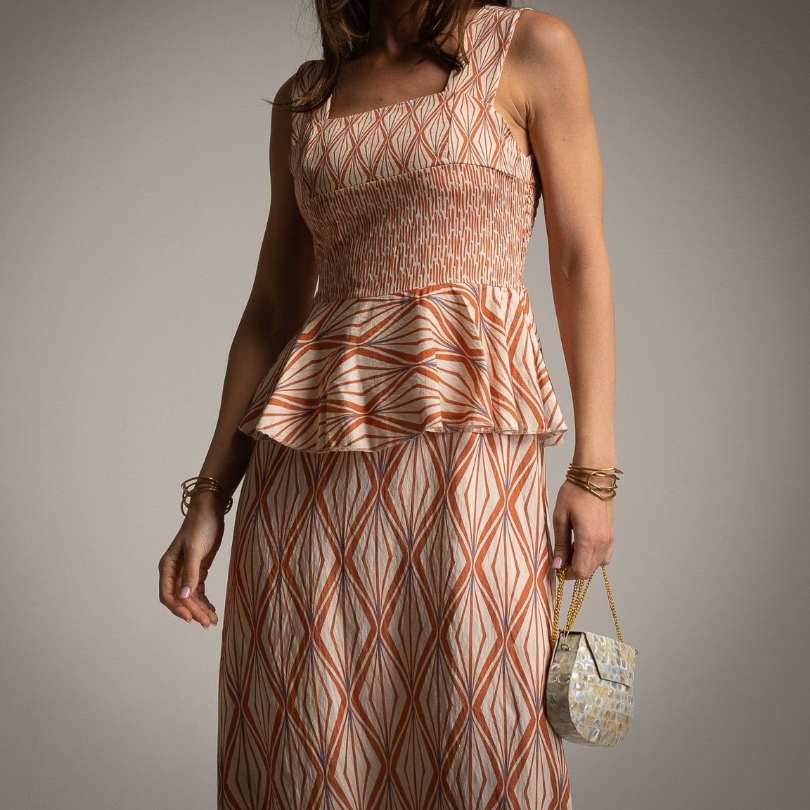 marigiou warm sunset bronze peplum midi dress detail