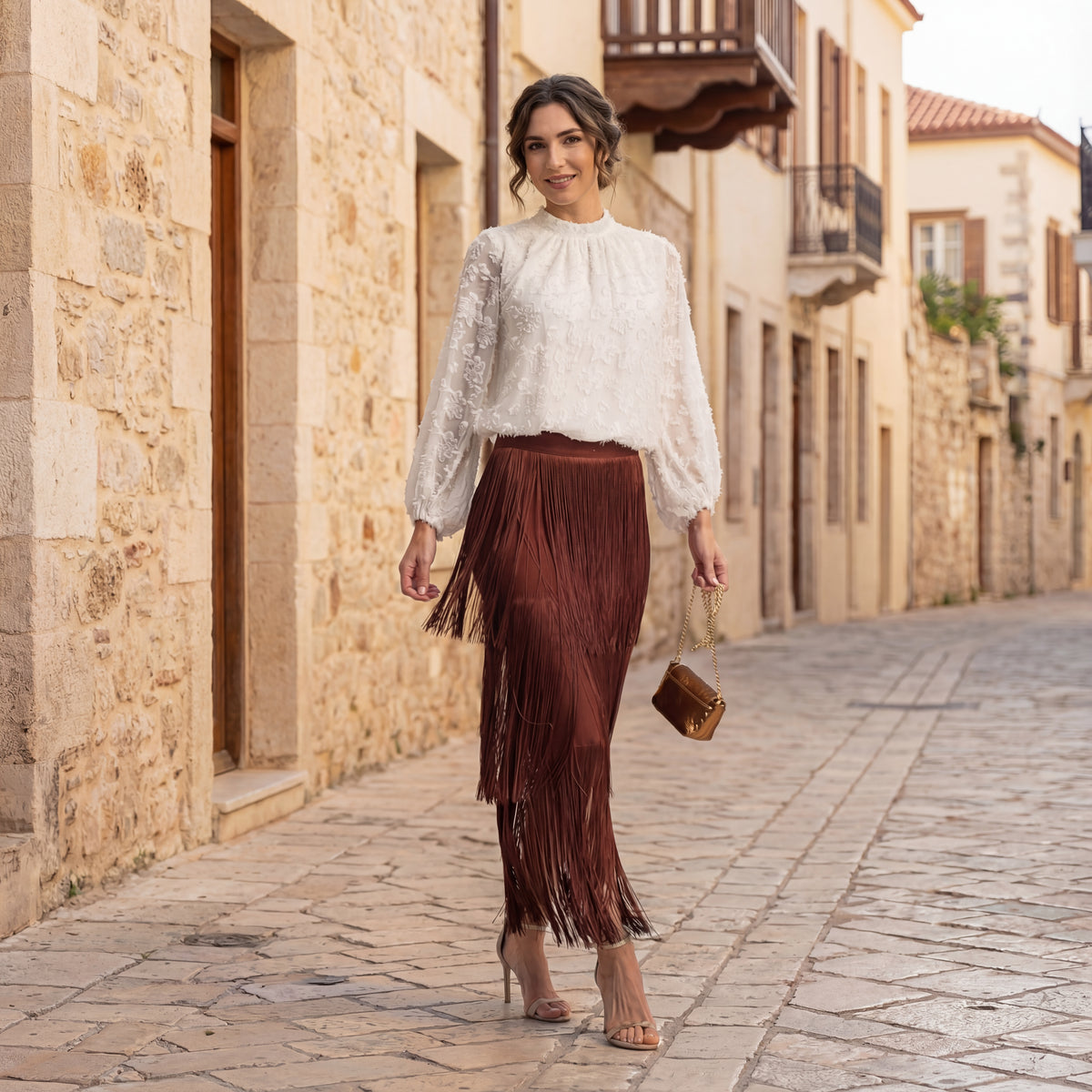 White textured blouse styled with fringe skirt – outdoor look