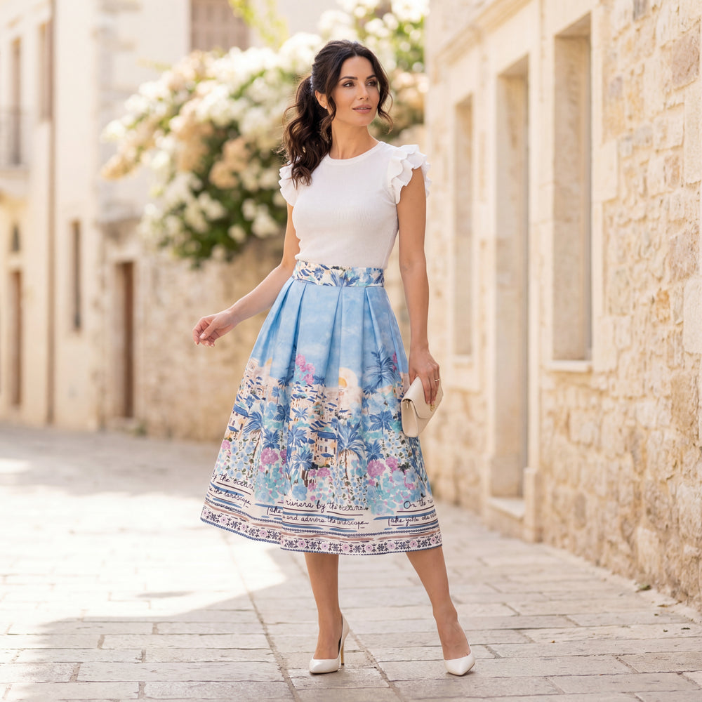 MARIΓIOÚ mediterranean island print midi skirt pastel blue chic summer styling