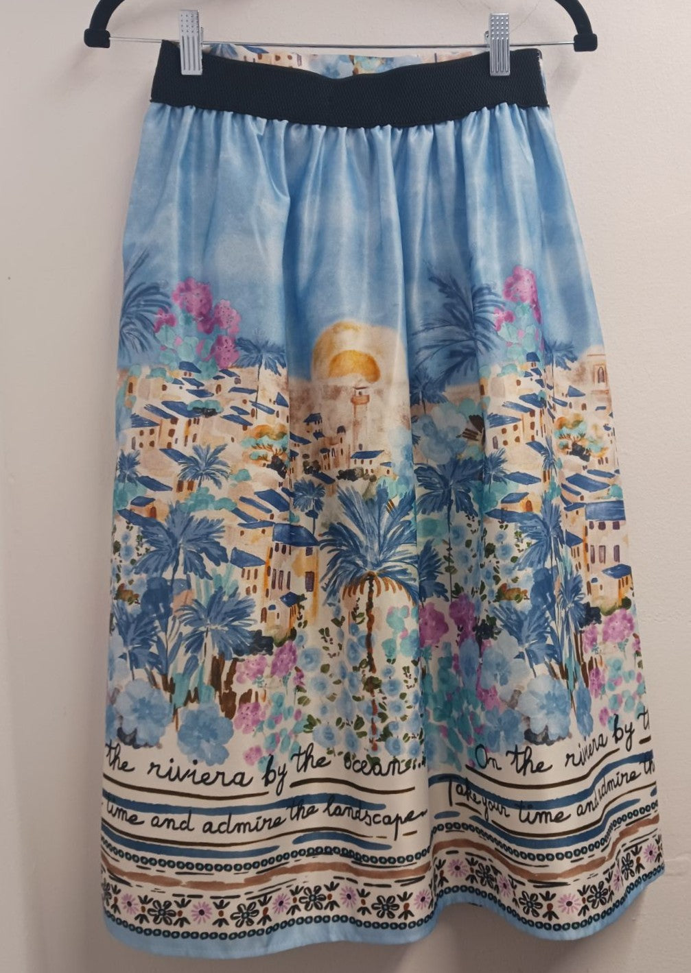 MARIΓIOÚ pastel blue mediterranean island print midi skirt back elegant shape