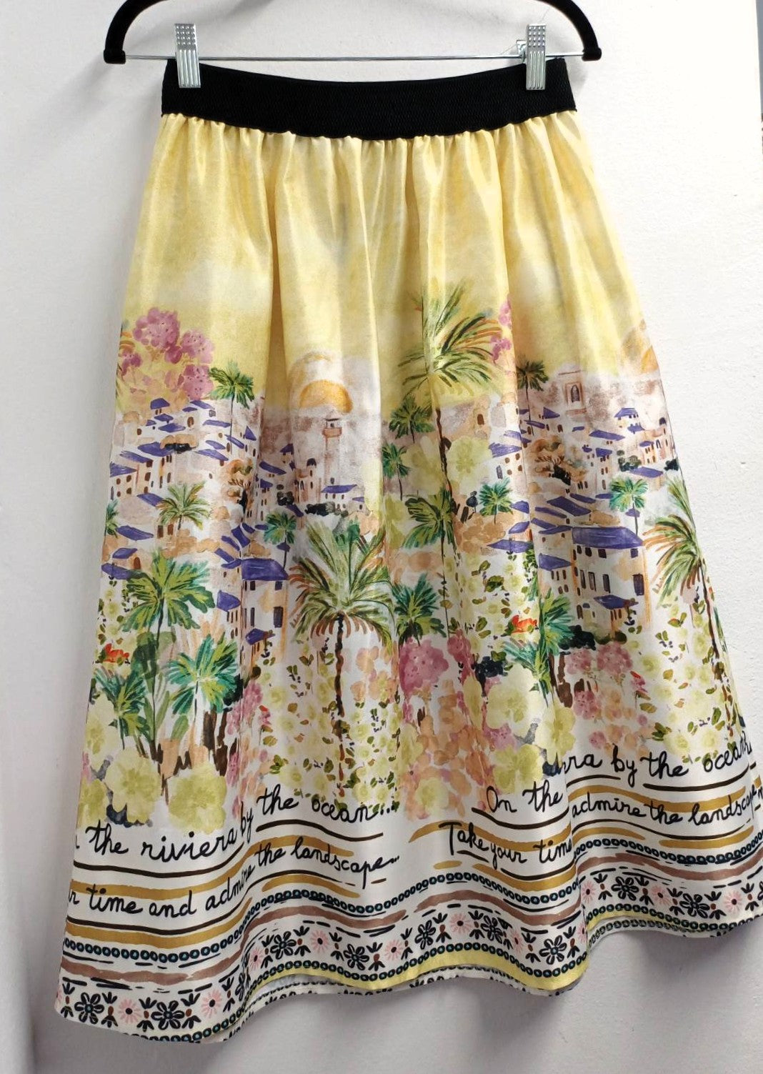 MARIΓIOÚ pastel yellow mediterranean island print midi skirt back view