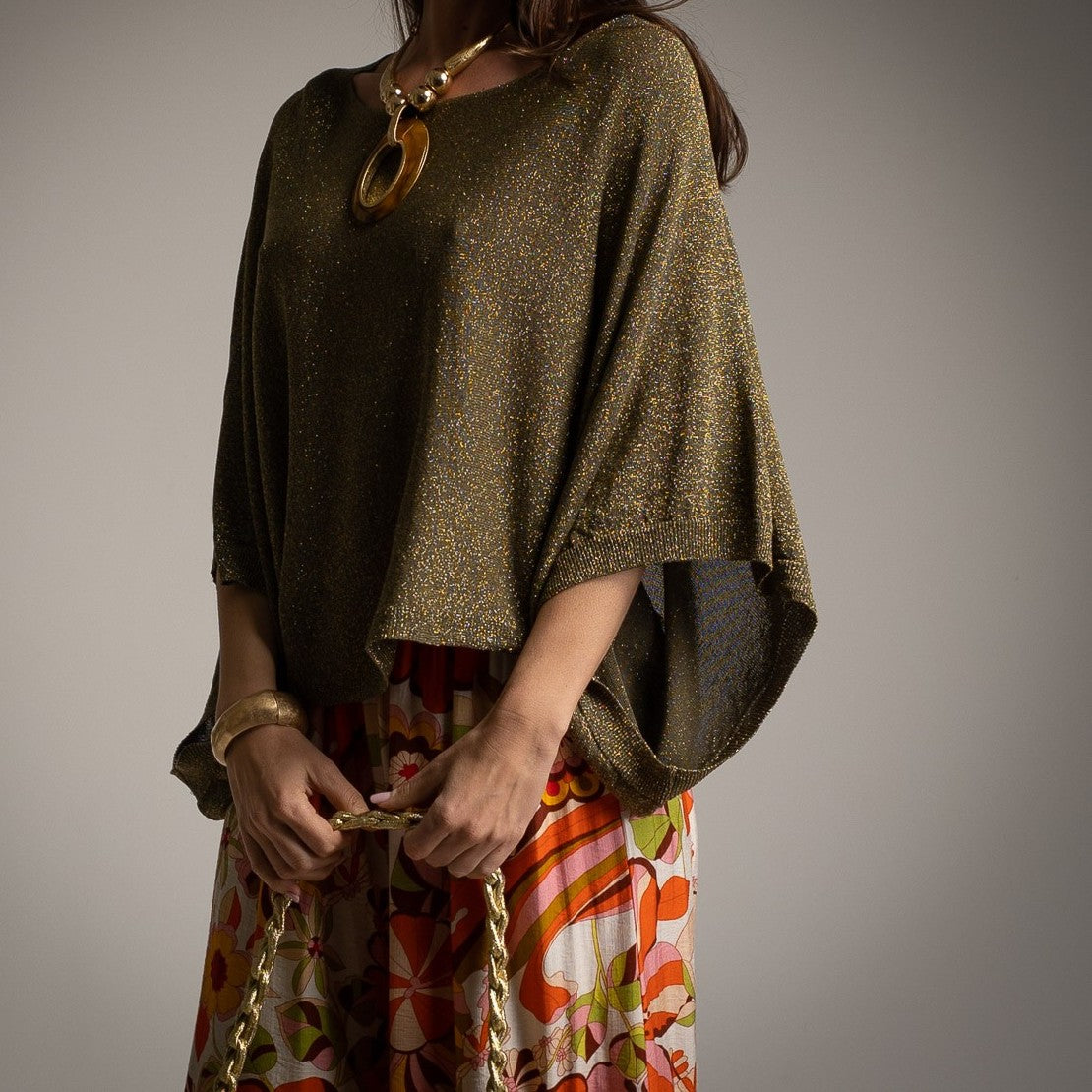 MARIΓIOÚ Shimmering Lurex Batwing Top in Olive – front view