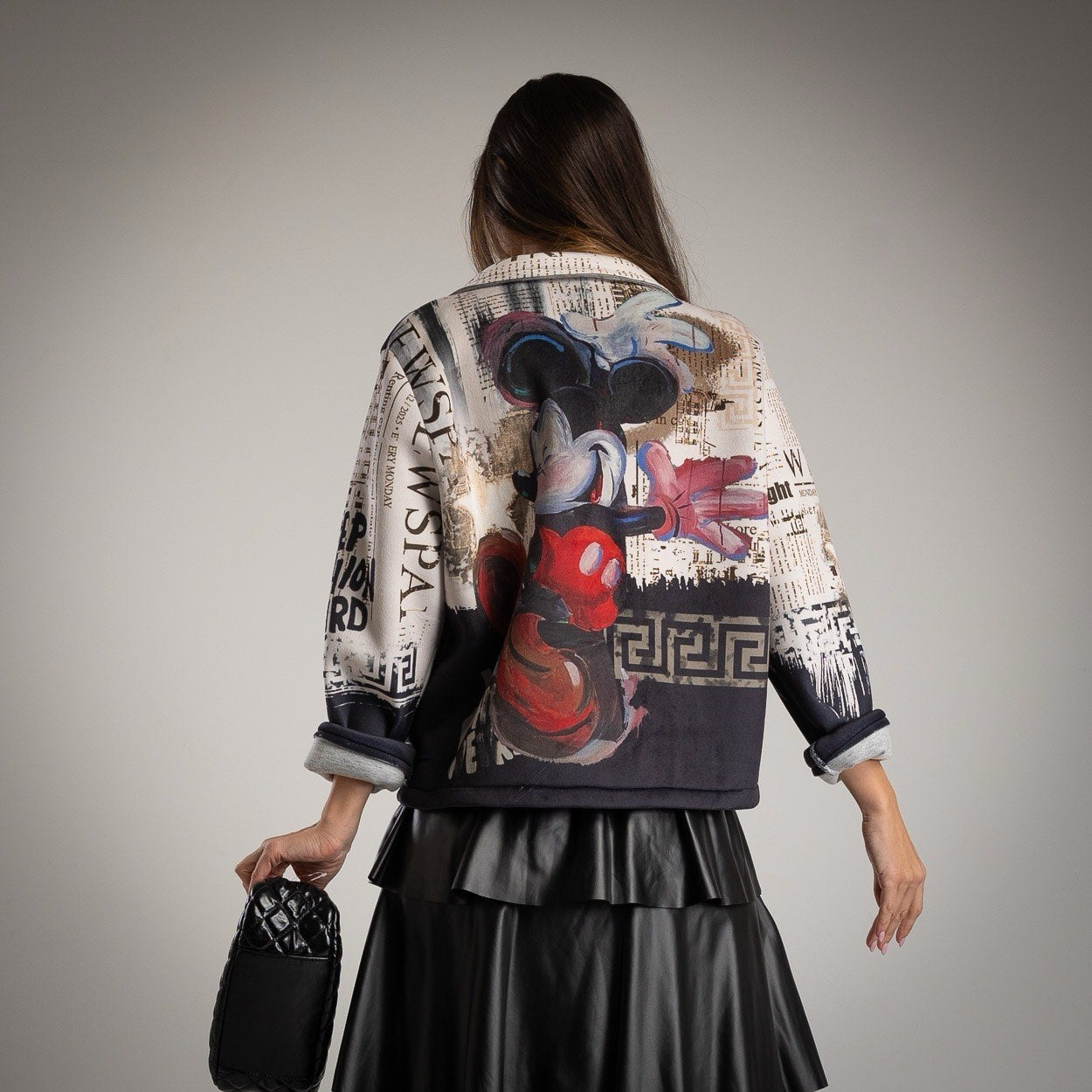 Back view of MARIΓIOÚ Mickey neoprene jacket with bold graphic print and text details.