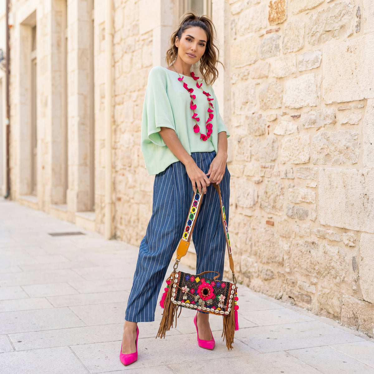 Mint oversized soft top styled with striped trousers and pink heels by MARIΓIOÚ