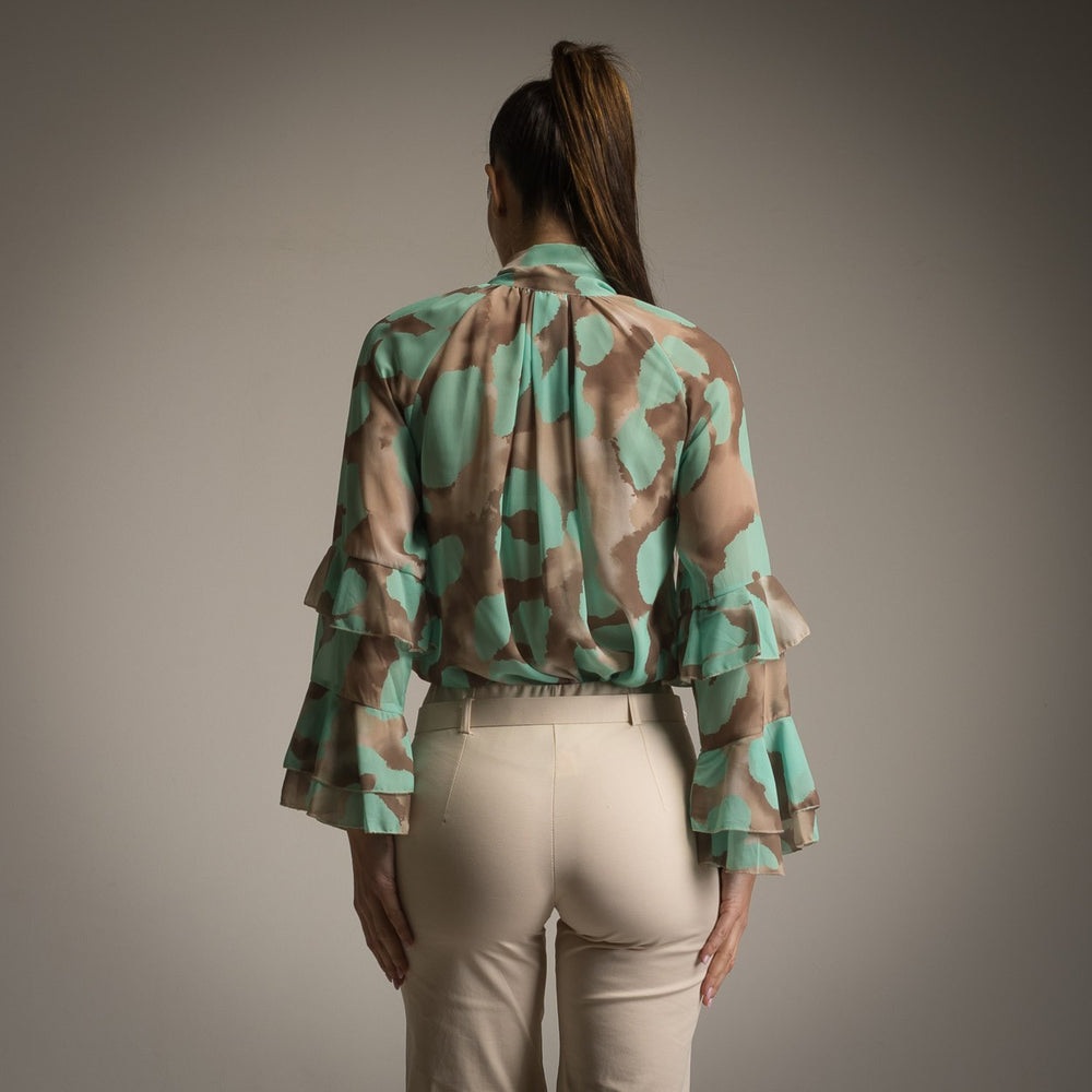 Back view of mint watercolour ruffle sleeve blouse