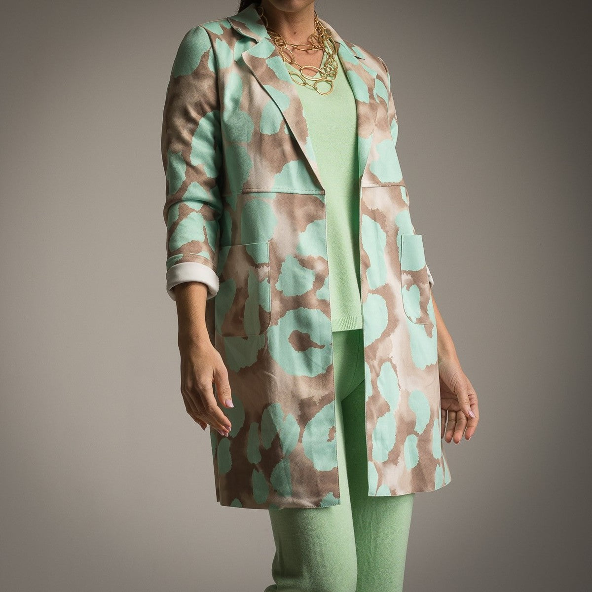 Mint watercolour suede jacket styled with matching mint outfit