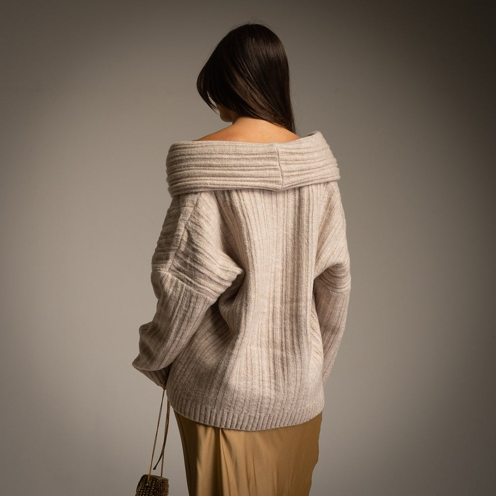 Back view of warm off-shoulder knit sweater with relaxed fit
