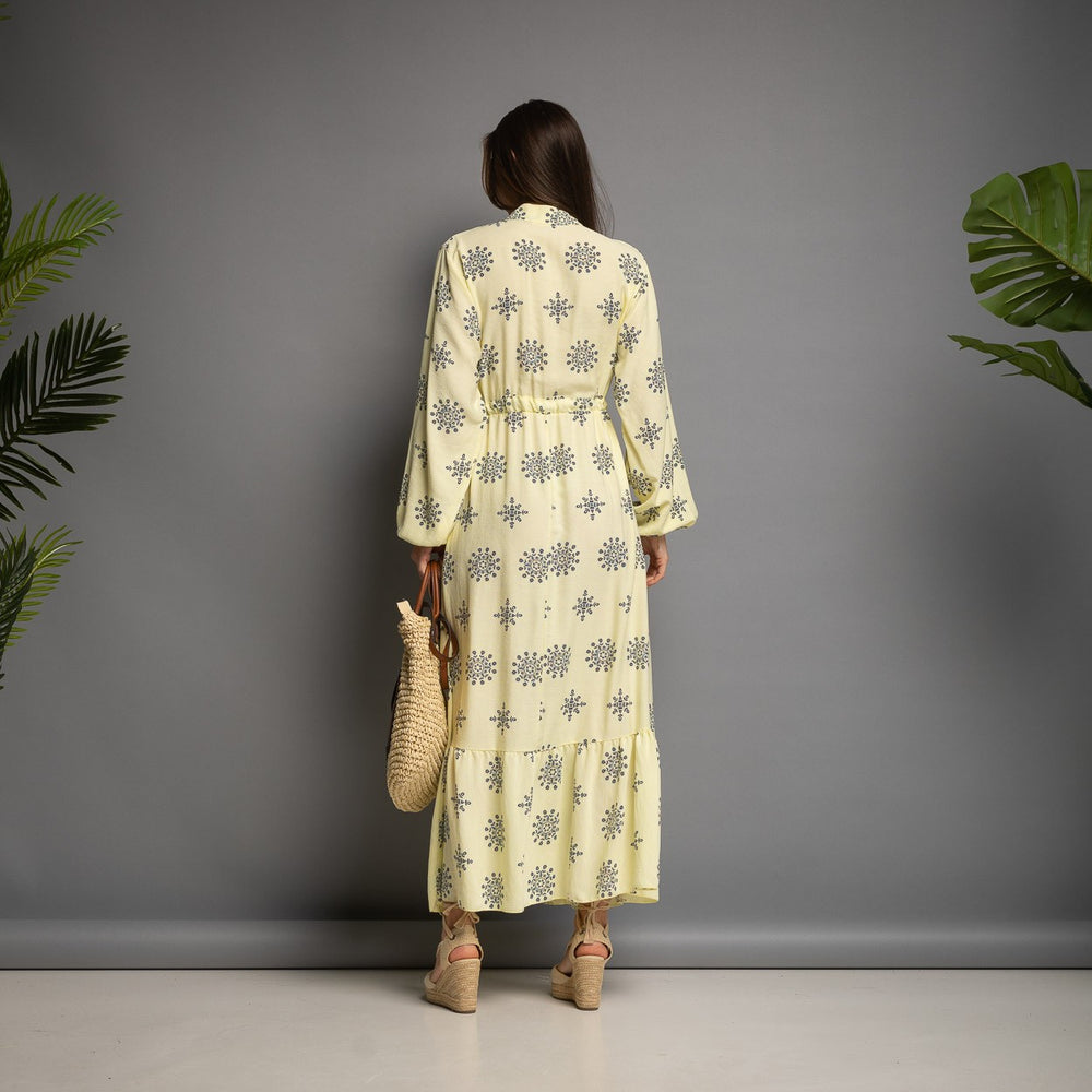 Pastel yellow printed maxi dress back view with long sleeves