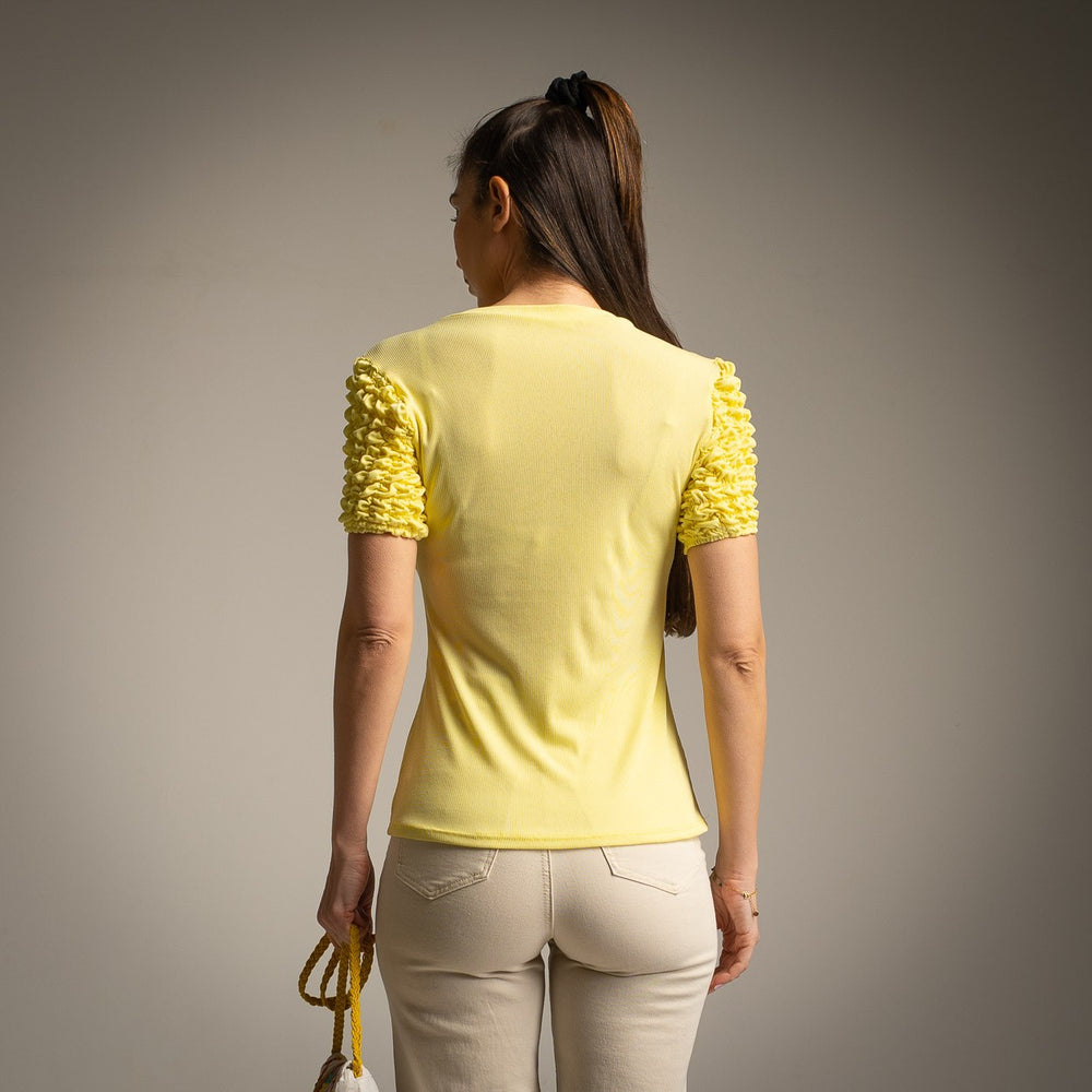 Pastel yellow ribbed shirt with ruffled sleeves back view one size by MARIΓIOÚ