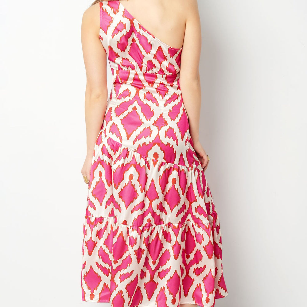 Back view of satin midi dress with vibrant pink geometric pattern