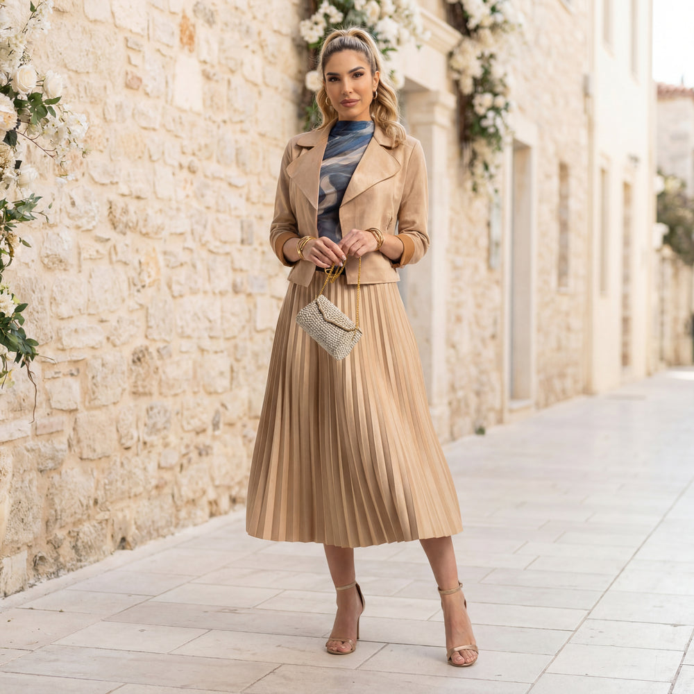 Full body look of beige pleated suede midi skirt styled elegantly with a jacket– MARIΓIOÚ