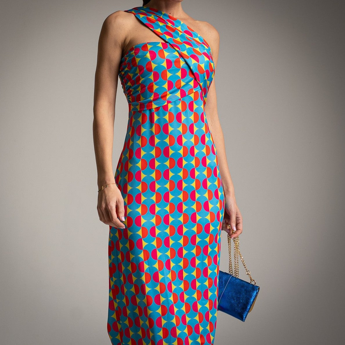 Yellow retro one-shoulder midi dress detail with asymmetrical neckline and tailored fit