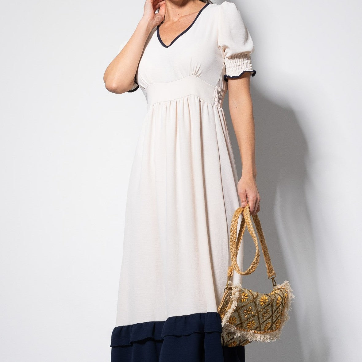 Romantic cream midi summer dress with V-neck contrast trim and puff sleeves, front detail